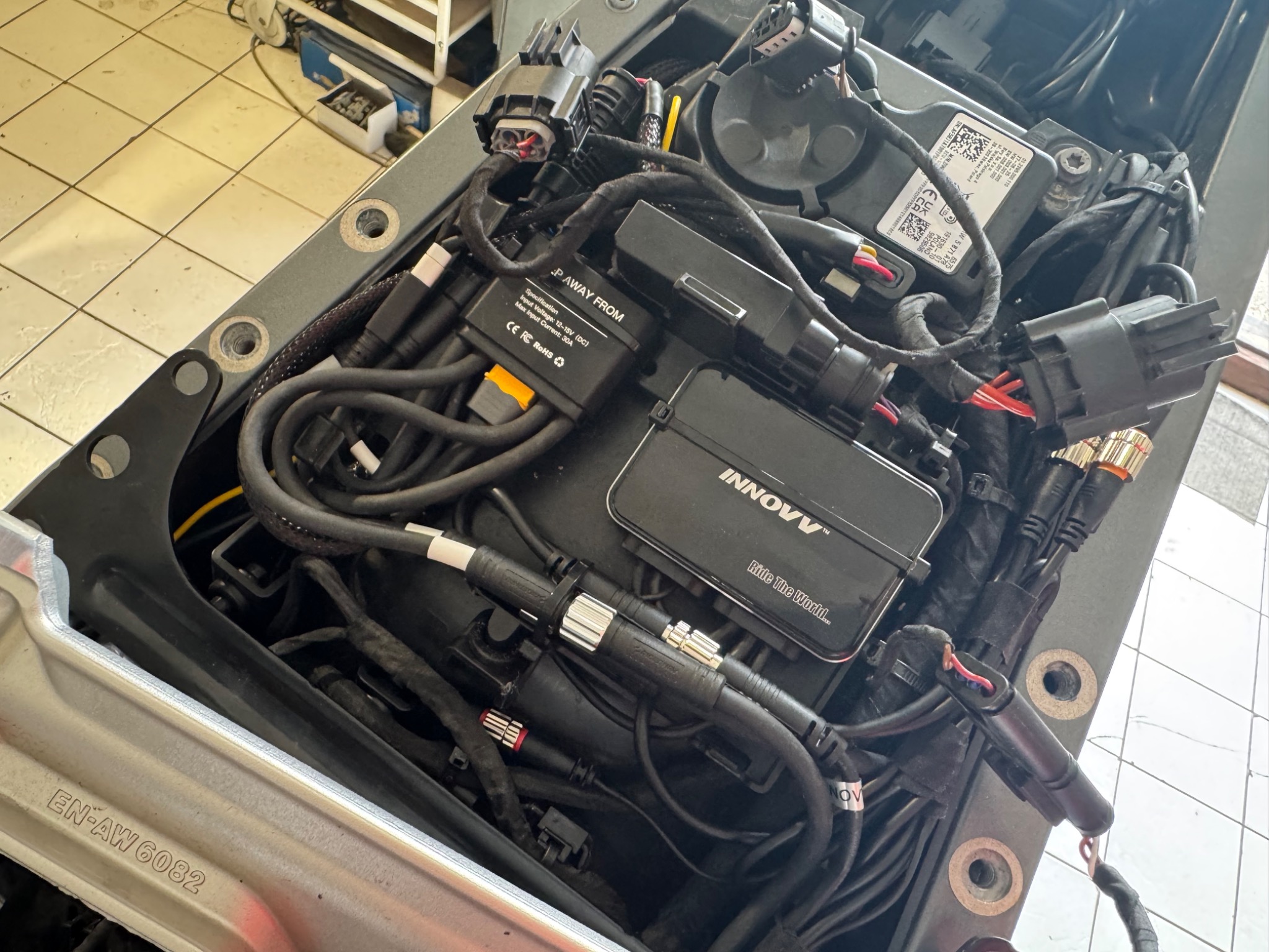 INNOVV K7 recorder installed beneath the motorcycle seat