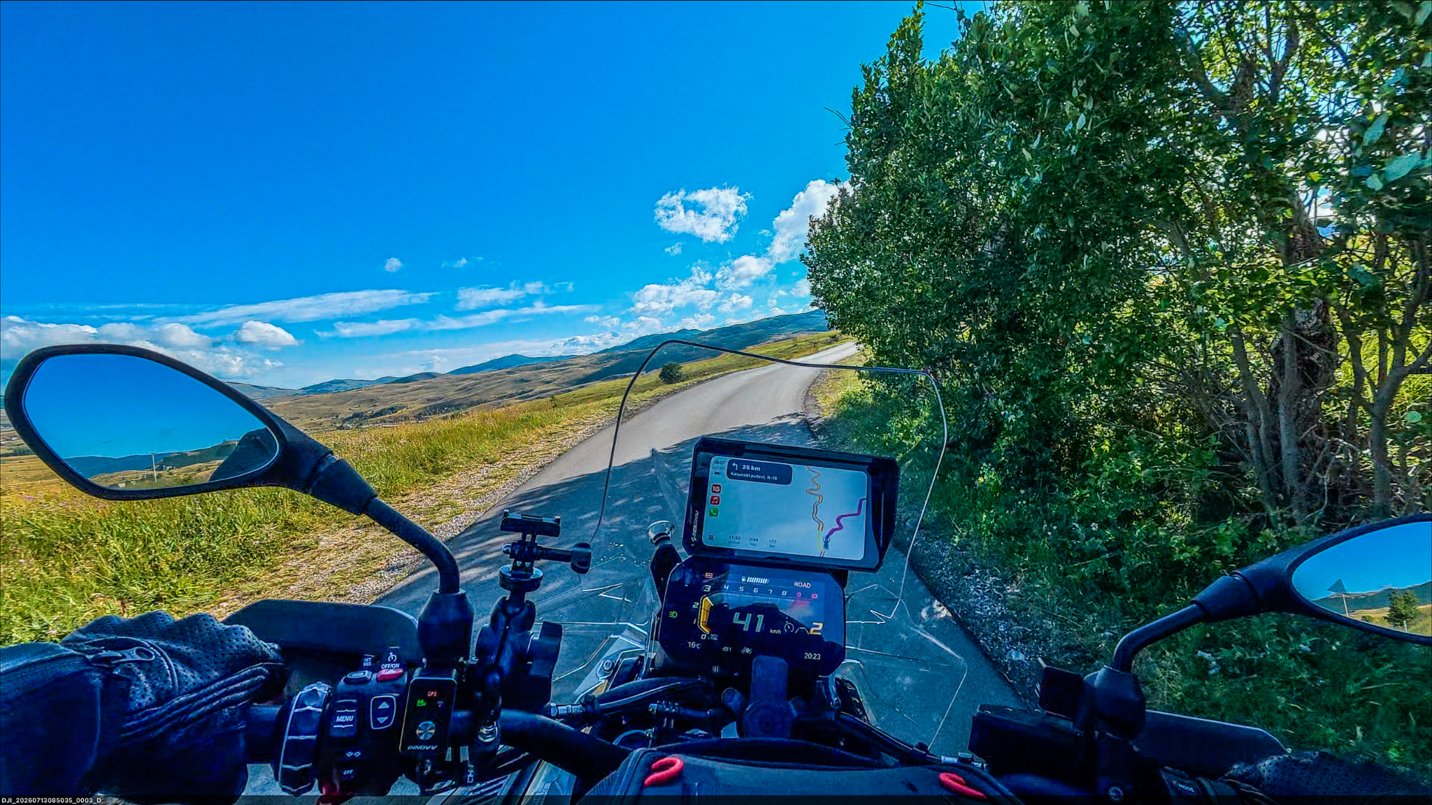 RiderNav navigation display on a mountain road